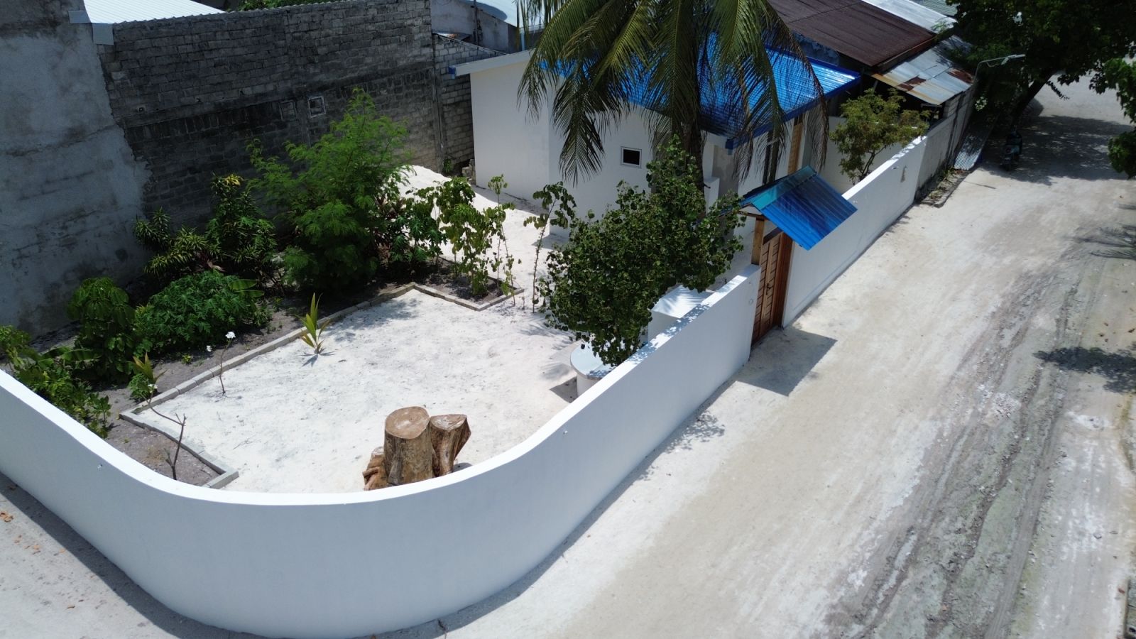 Aerial perspective tracking the property courtyard canopy path